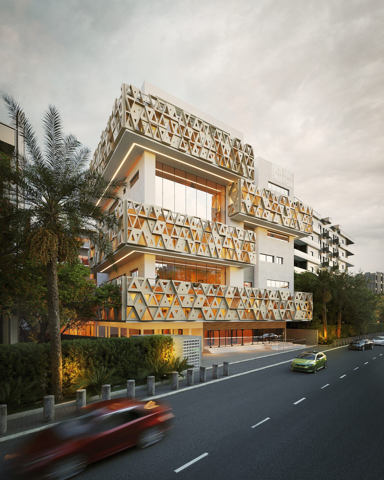 Complexe immobilier à Abidjan — vue de la façade et de ses volumes décalés au crépuscule
