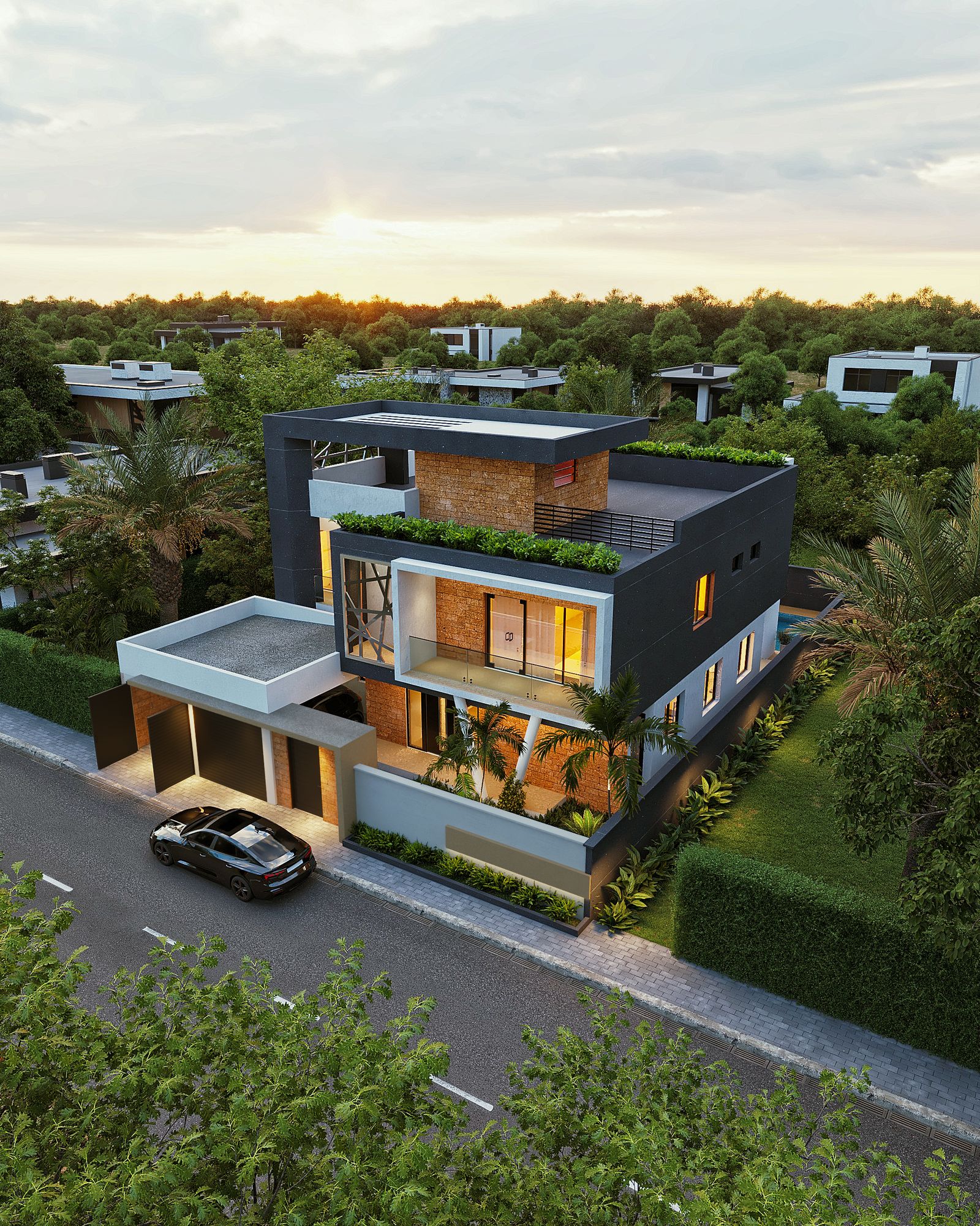 Triplex Cle — vue aérienne de la villa et de son quartier au coucher du soleil